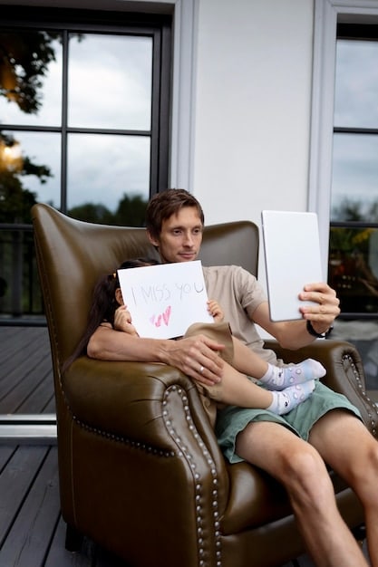 A person sitting in a comfortable armchair, holding a memoir in their hands. The person is surrounded by soft lighting and a bookshelf filled with various books. The scene conveys a sense of introspection and emotional connection with the story being read.