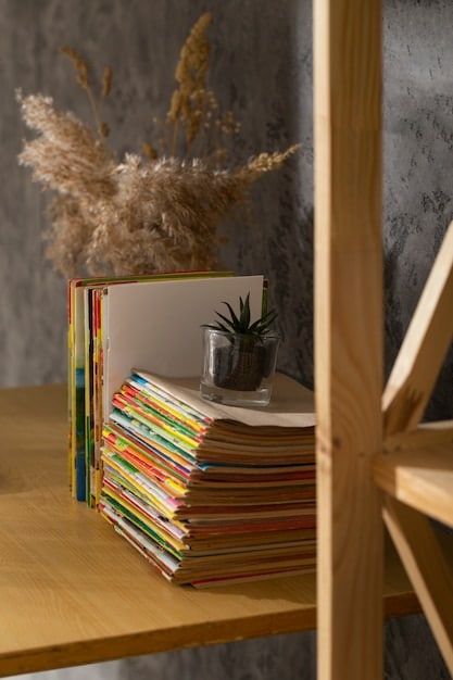 A close-up shot of a table filled with a variety of books, neatly organized by genre. Each book is carefully placed, and some have small handwritten notes attached, describing why they were chosen or enjoyed.