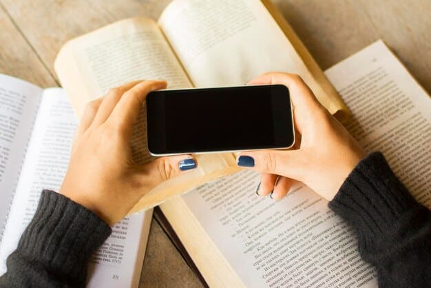 A close-up shot of a smartphone screen displaying a BookTok video. The video shows a person reacting emotionally to a book, with text overlay highlighting key themes and trigger warnings.