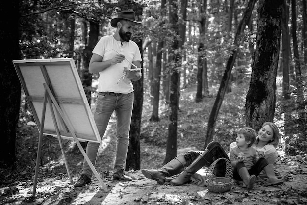 A black and white image of a film set, with actors rehearsing a scene. The director is giving them instructions, emphasizing the importance of natural and believable dialogue delivery.