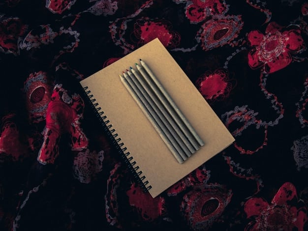 A close-up of a theater critic's notebook, with scribbled notes and highlighted passages. The background is blurred, showing a dimly lit theater during a performance.