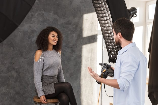 A behind-the-scenes photograph showing a critic talking to a theater director during an intermission. The atmosphere is casual, but the image suggests potential lines being blurred between professional objectivity and personal relationships.