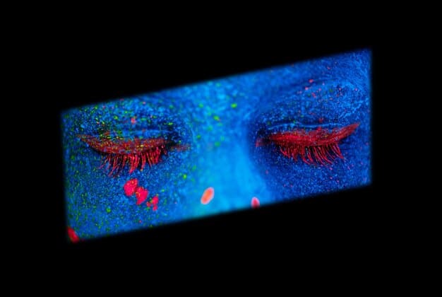 A close-up shot of a person's eyes glued to a screen displaying a streaming movie. The reflection in the eyes shows iconic characters and scenes from Netflix, Disney+, and other major streaming platforms.