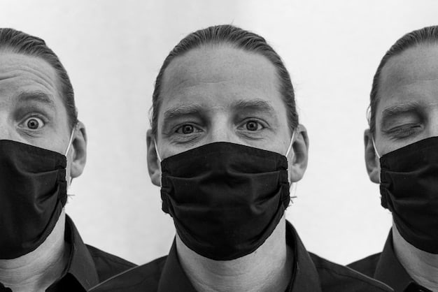 A black and white photo showing striking workers holding signs, their faces conveying a mix of anger and determination. A backdrop of industrial factories highlights their struggle against capitalist forces, illustrating themes present in 'Deconstructing the American Dream: A Marxist Literary Criticism Analysis of Contemporary American Plays'.